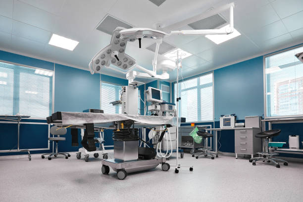 istock Large spacious operating board with a large amount of light, with modern equipment for various complex operations, operating table, lamps, ventilator 1332370513