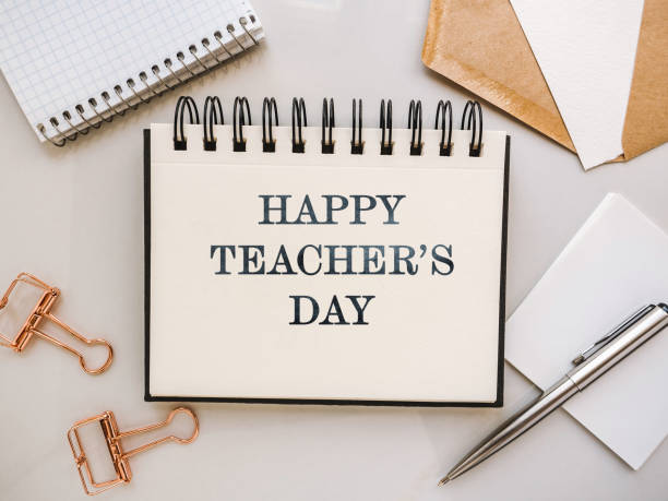 istock Happy Teacher's Day. Notepad with a congratulatory inscription 1332371251