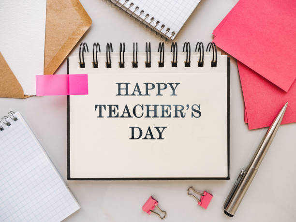 istock Happy Teacher's Day. Notepad with a congratulatory inscription 1332371301