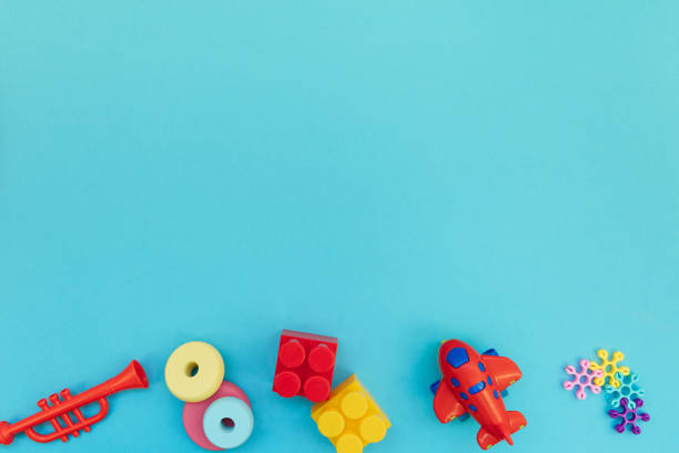 istock Background with plastic kids toys with copy space 1332371361