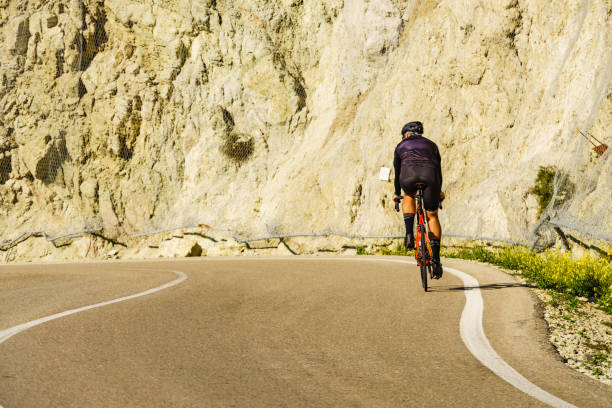 istock Cyclist on road in mountains, Spain 1332372349