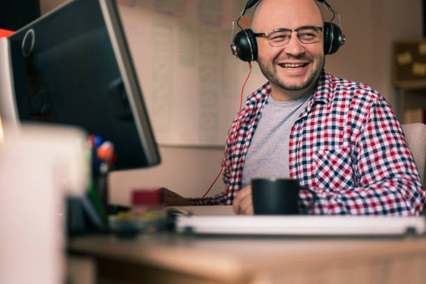 istock Male web designer working in an office 1332373835