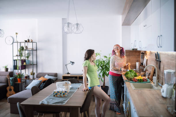 istock Women preparing lunch at home 1332376083