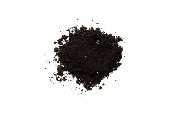 istock Black land for plant isolated on white background. 1332378695