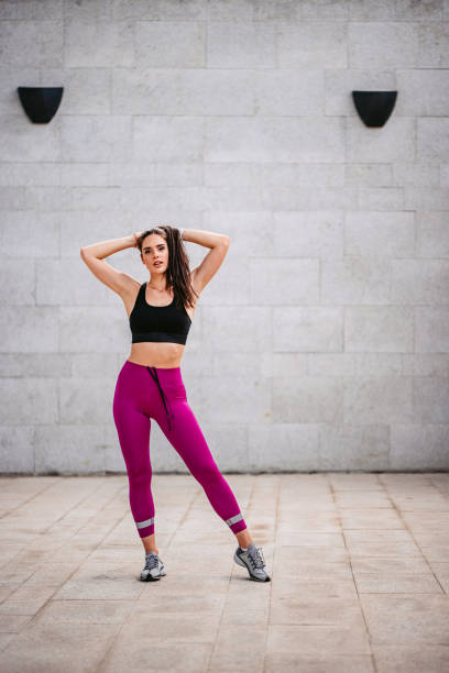 istock Beautiful fitness model posing on camera 1332378833