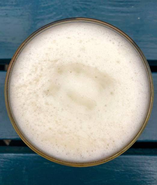 istock Beer in a glass on a table 1332379672