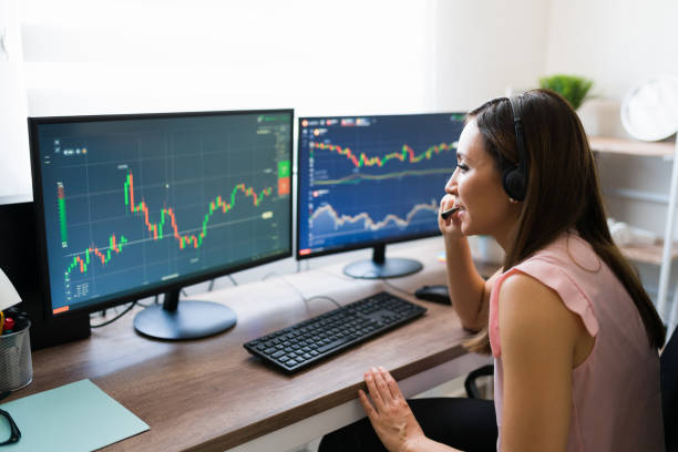 istock Talking with a customer about investing 1332379804