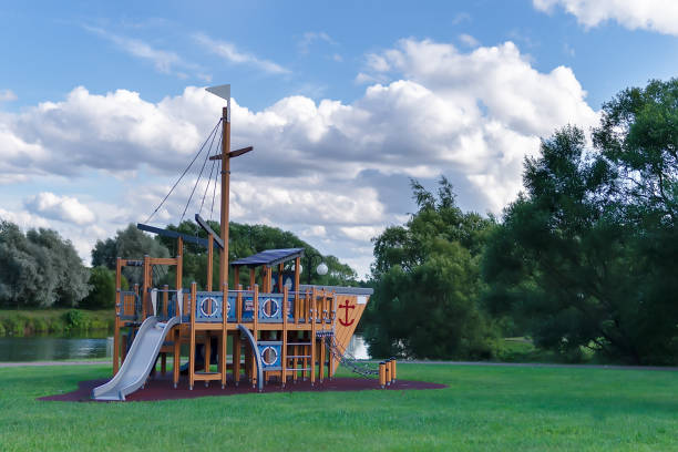 Playground in the form of the ship under the cloudy sun