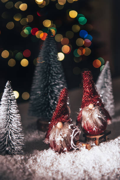 istock Christmas Gnomes in snowy forest, xmas postcard 1332381026