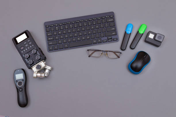 istock Digital Gadgets on Grey Table - Video Blogger's Workplace 1332381672