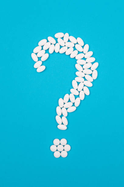 istock White Question Mark. Pharmaceutical Industry and Medicinal Products 1332381756