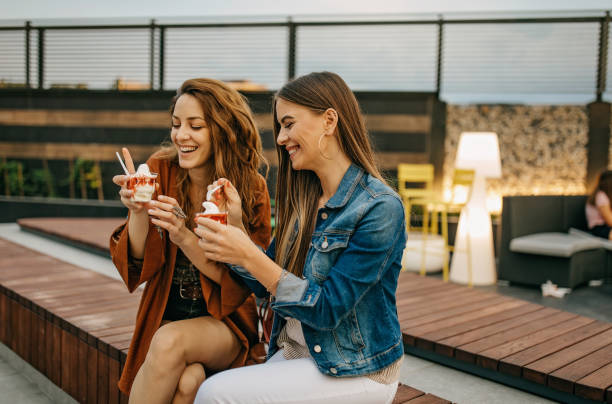 istock Friends eating ice cream 1332381926