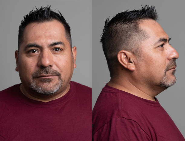 istock Serious hispanic mature man front and profile mugshots 1332384268