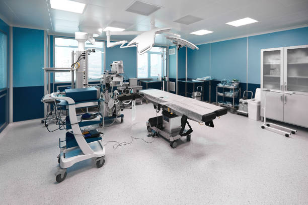 istock Large spacious operating board with a large amount of light, with modern equipment for various complex operations, operating table, lamps, ventilator 1332387064