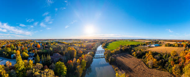 istock Aerial Railway Bridge and Conestogo River at dusk, St. Jacobs, Canada 1332387326