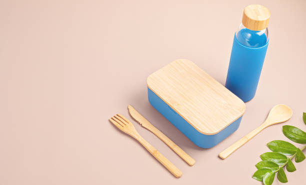 Zero waste kit for lunch, reusable bottle, box and bamboo cutlery Zero waste kit for takeaway lunch, reusable bottle, box and bamboo cutlery. Sustainable lifestyle concept blue reusable water bottle stock pictures, royalty-free photos & images