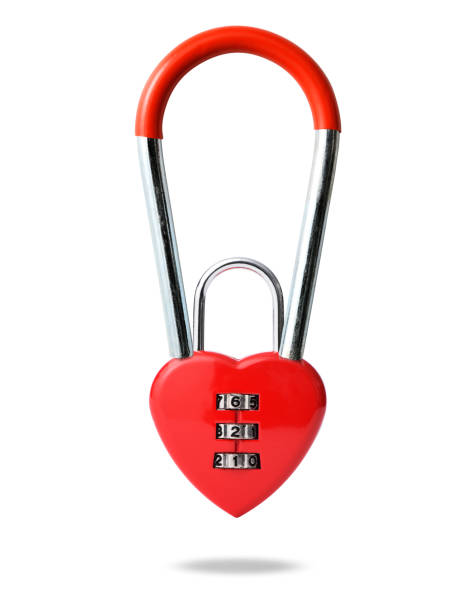 istock Horseshoe magnet with heart shape combination lock in mid-air against white background 1332418073