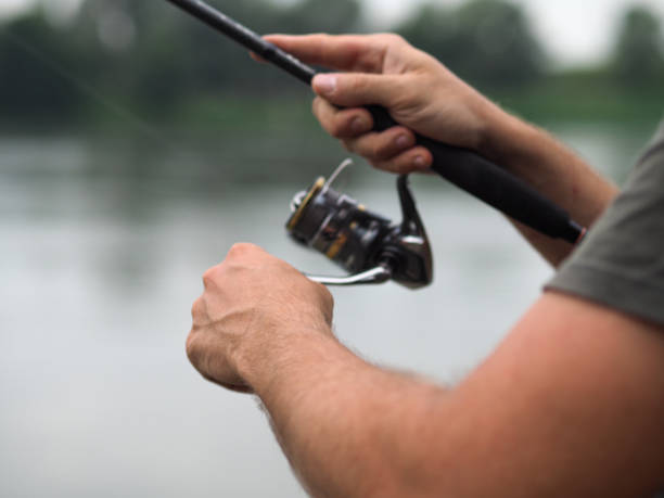 istock spin fishing in the river 1332428538