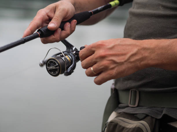 istock spin fishing in the river 1332428540