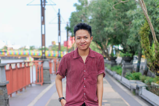 istock Happiness smiling Casual Young Men at park 1332432069