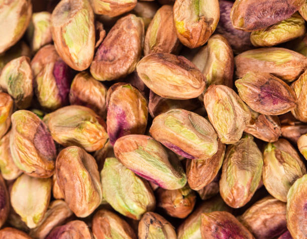 istock Delicious peeled pistachios. 1332432372