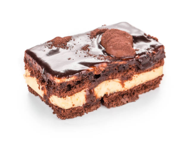 istock A piece of chocolate cake with custard. 1332433414