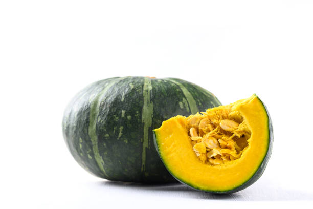 istock Green pumpkin on white background 1332438753