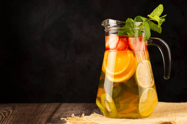istock Water flavored with fresh summer fruit. 1332438800