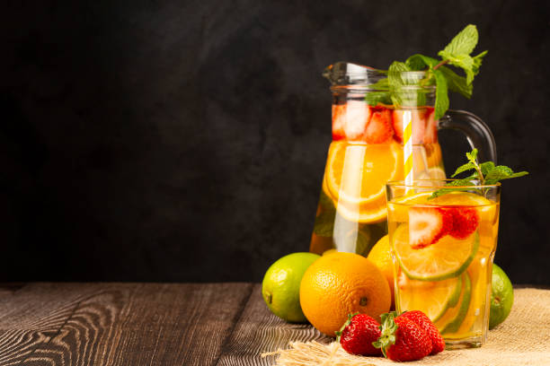 istock Water flavored with fresh summer fruit. 1332438838
