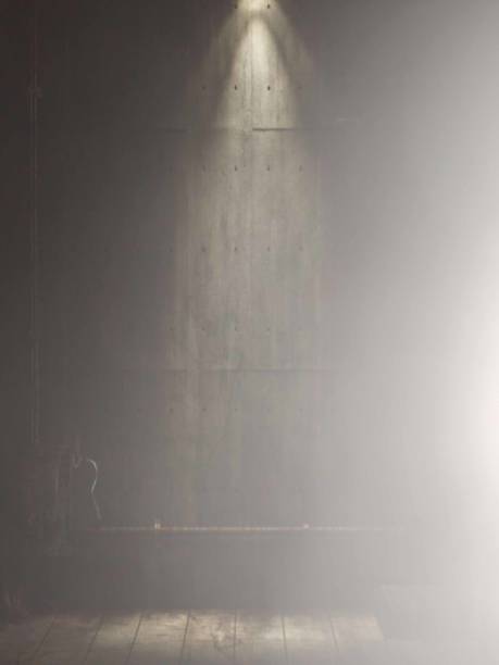 istock The dark and light background image. Abstract background picture. Illuminated background image. Grey with spotlight wall background image 1332442578