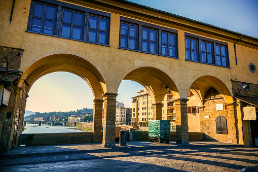 A glimpse of the arcade of Ponte Vecchio and the Vasari corridor in the medieval heart of Florence