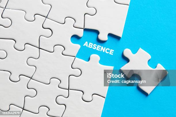 The Word Absence On Missing Puzzle Piece Stock Photo - Download Image Now - Absence, Employee, Illness