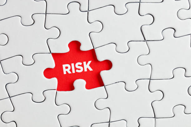 istock The word risk written on red missing puzzle piece. To discover or expose the hidden or underlying risks 1332443994