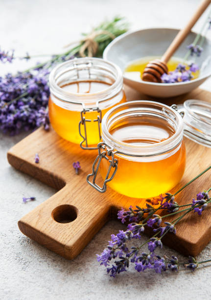 istock Jars with honey and fresh lavender flowers 1332446630