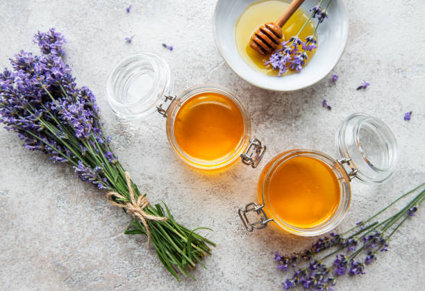 istock Jars with honey and fresh lavender flowers 1332446633