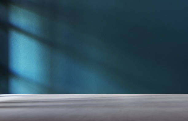 istock 3D rendering of empty room. Concrete floor and teal wall. 1332447829