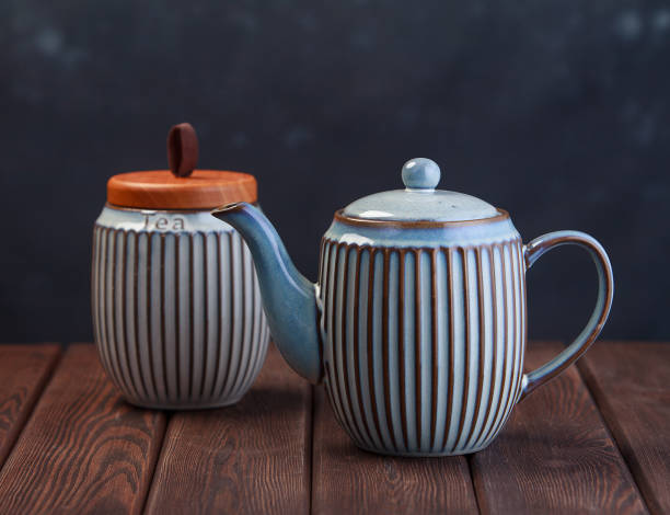 istock gray ceramic tea pot on wooden table 1332448539