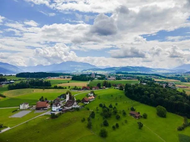 Background of grass and pasture shot from above with a drone. Background with copy space.