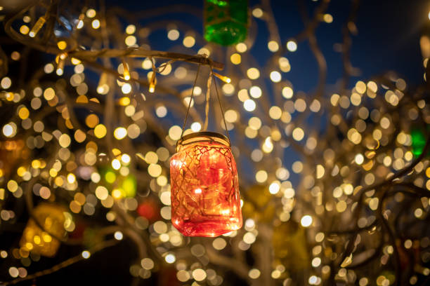 istock Colorful fairy light in a glass jar 1332456429