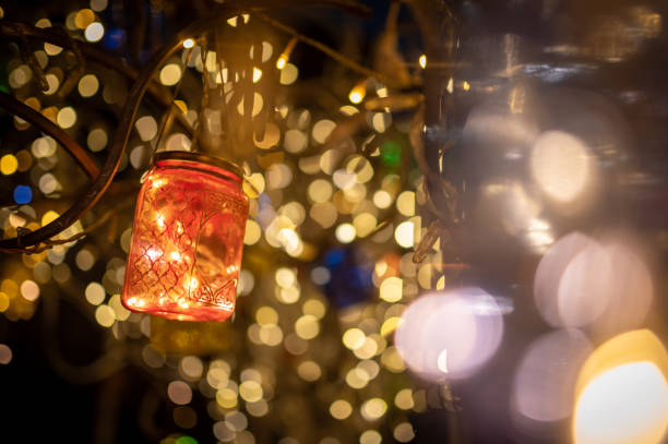 istock Colorful fairy light in a glass jar 1332456430