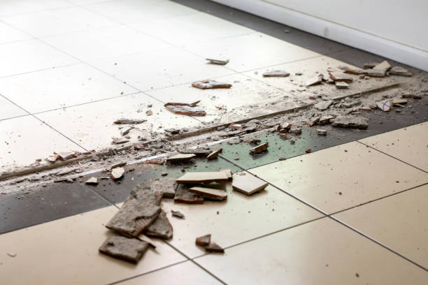 istock Broken tiles removing for repair. 1332456969