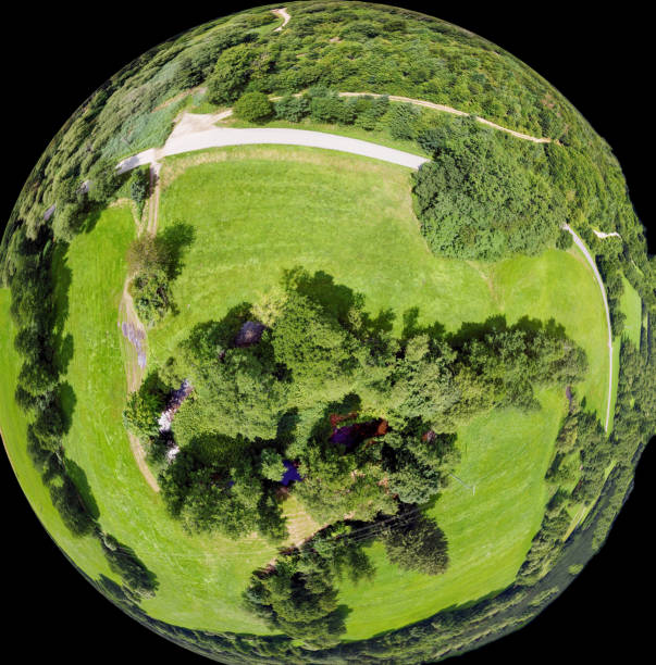 istock Imaginative spherical, abstract panoramic aerial view in a field with fantastic beautiful clouds and the curvature of space like a small planet 1332456986