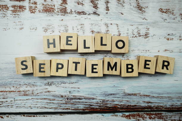 istock Hello September alphabet letters on wooden background 1332459005