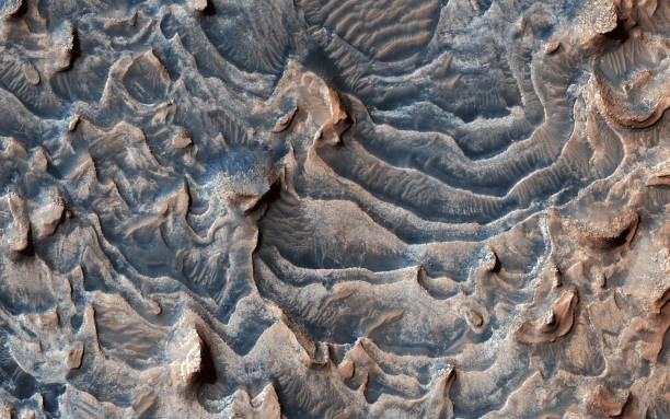 istock Fantastic martian landscape in rusty orange shades, Mars surface, Desert, Cliffs, sand. Alien landscape. Red planet mars. Elements of image furnished by NASA 1332460483