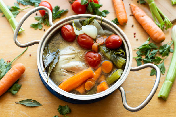 istock Homemade chicken broth with vegetables 1332465323