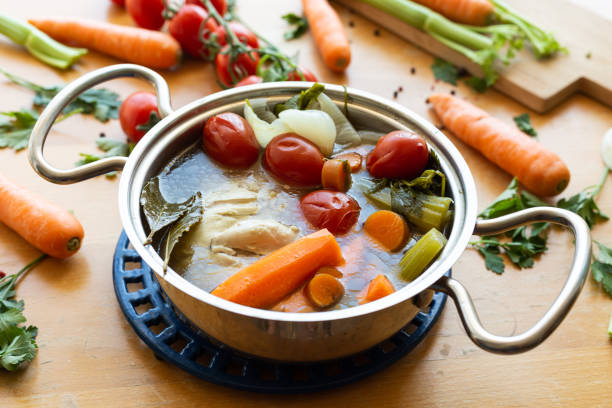 istock Homemade chicken broth with vegetables 1332465328