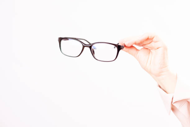 istock vision problems, selection of glasses with diopters, white background 1332466584