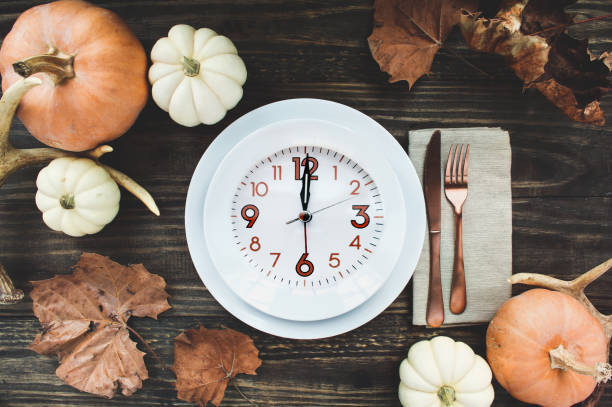 Beautiful Thanksgiving Table of Empty Place Setting with Decor Intermittent Fasting stock photo