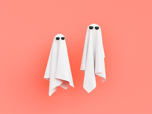 two cloth ghosts with sunglasses on red pastel background - material data sheets imagens e fotografias de stock