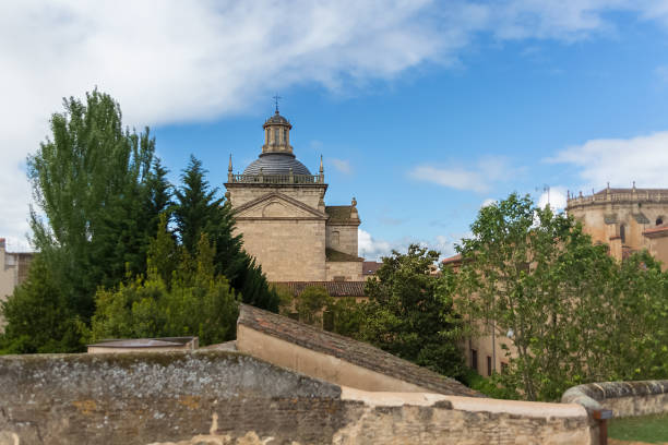 istock Back view at the dome copula tower at the iconic spanish Romanesque and Renaissance architecture building at the Iglesia de Cerralbo, downtown city 1332472669